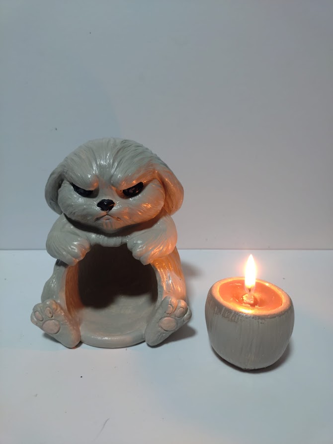 a)Reggie Rabbit candle holder